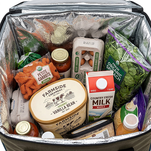 Groceries packed in an insulated reusable cooler shopping bag